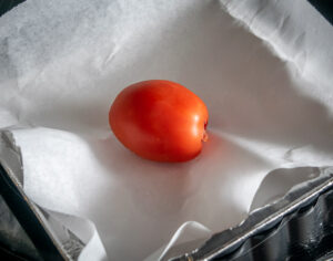 Roasting tomato for the tomato-jalapeno mixture