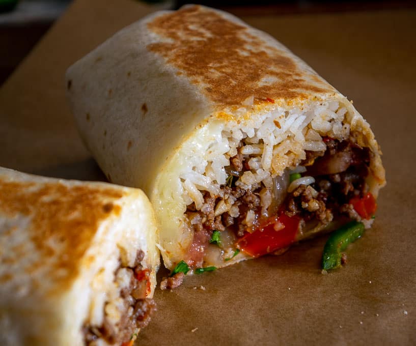 The combo of chipotle-infused beef and freshly chopped Pico works great in these Easy Ground Beef Burritos! 