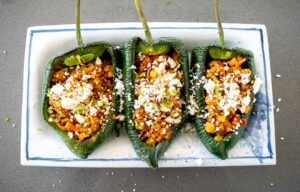 What a treat to put these Picadillo Stuffed Poblano Peppers on the kitchen table in front of friends and family! They are easy to make and have a unique, satisfying flavor.
