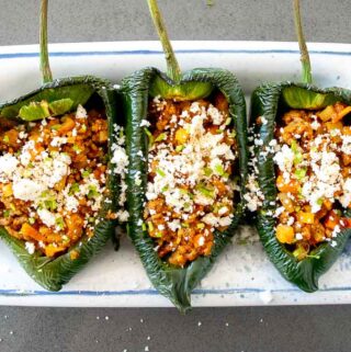 What a treat to put these Picadillo Stuffed Poblano Peppers on the kitchen table in front of friends and family! They are easy to make and have a unique, satisfying flavor.