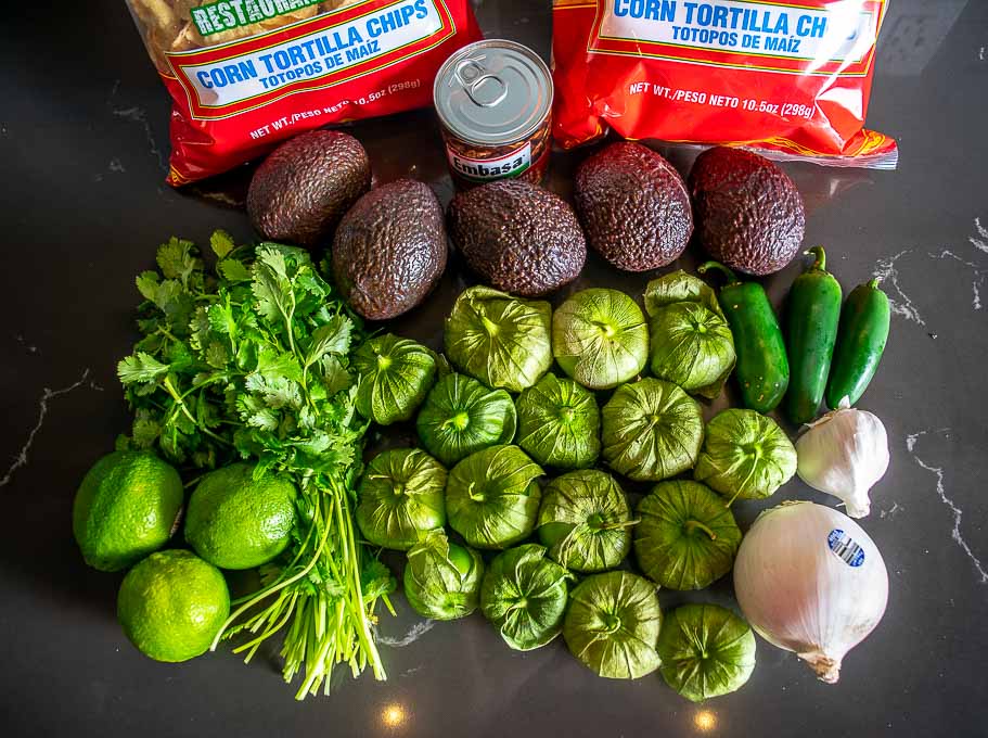 All the ingredients for making Guacamole and both Salsas
