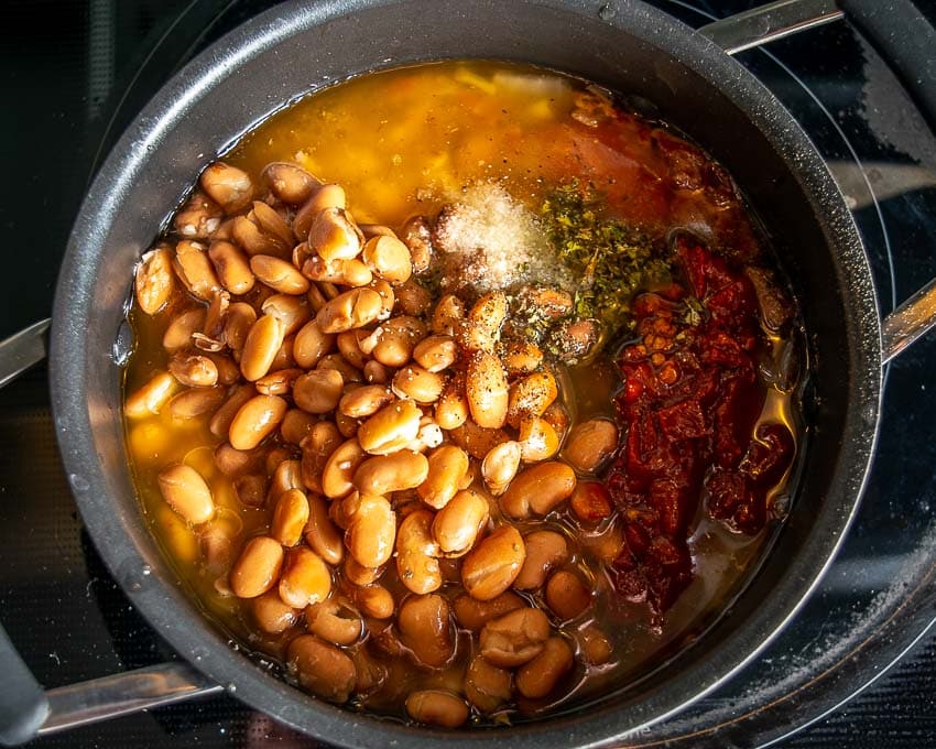 Adding the remaining ingredients to the pan