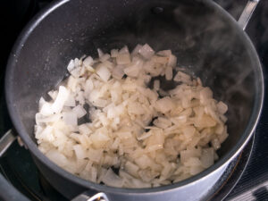 Adding finely chopped onion to the bacon drippings