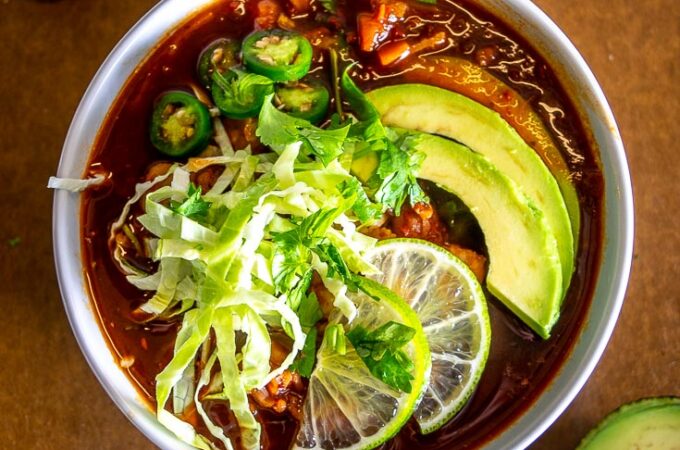 This is a great Vegetarian Red Pozole recipe to keep in mind! Be sure to add some savoriness to your Pozole -- I used some veggie stock with nutritional yeast, but you could also just add some fat to your broth to get a similar effect.