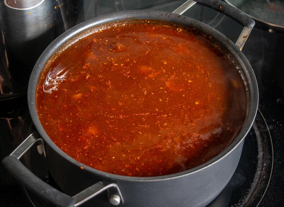 Pan full of Pozole after adding the chile puree