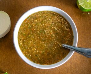 Single cup of Roasted Tomato and Tomatillo Salsa