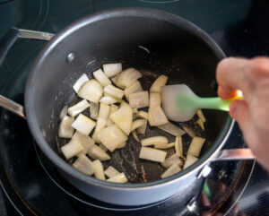 Cooking onion for the Poblano soup