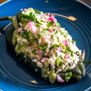 Here's another impromptu meal I make for some quick eats...Vegetarian Stuffed Poblanos. Stuffing a freshly roasted Poblano with a simple rice-and-beans mixture is as easy as it gets, but I'm always amazed how satisfying these leftover-type meals can be.