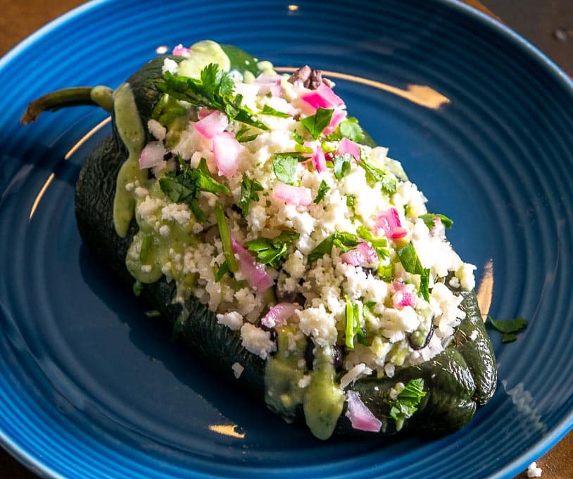 Here's another impromptu meal I make for some quick eats...Vegetarian Stuffed Poblanos. Stuffing a freshly roasted Poblano with a simple rice-and-beans mixture is as easy as it gets, but I'm always amazed how satisfying these leftover-type meals can be.