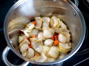 Cooking onions and carrots for the chicken stock