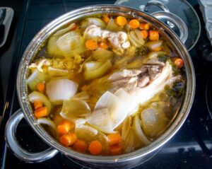 Batch of chicken stock after simmering for 90 minutes