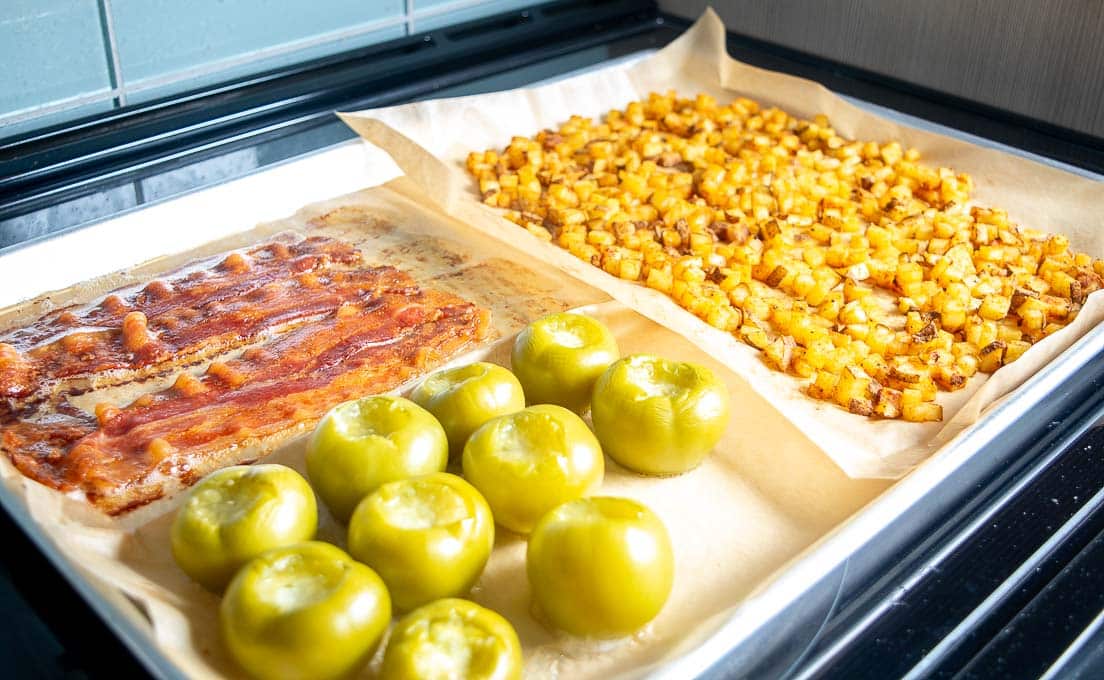 Potatoes, bacon, tomatillos after baking in the oven