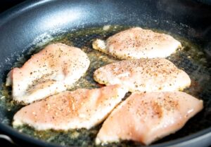 Cooking the chicken breasts for the Creamy Chipotle Chicken