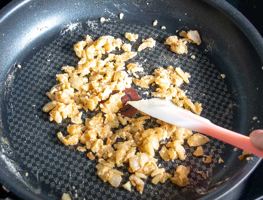 Adding flour to the onion garlic mixture