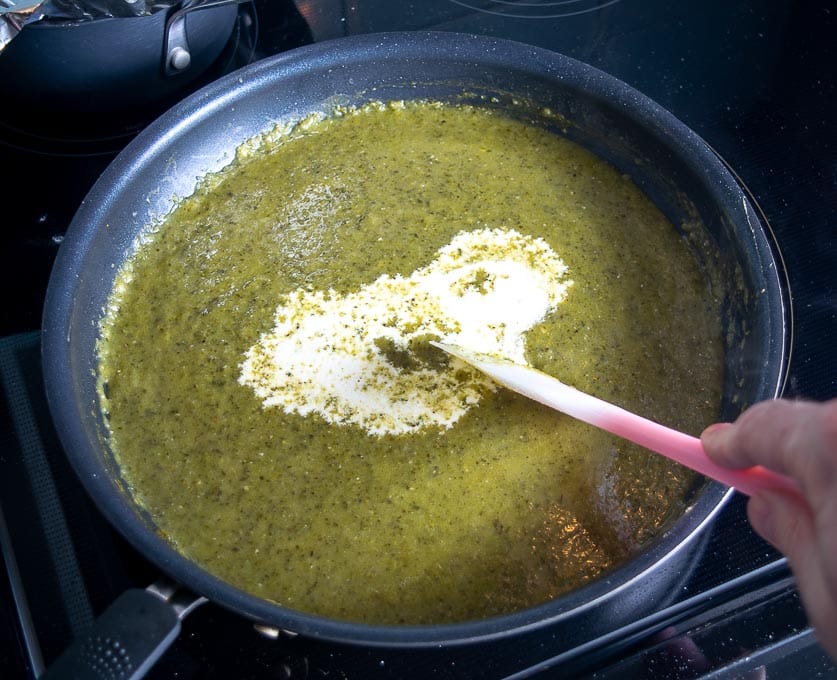 Adding 1/2 cup heavy cream to the Poblano sauce