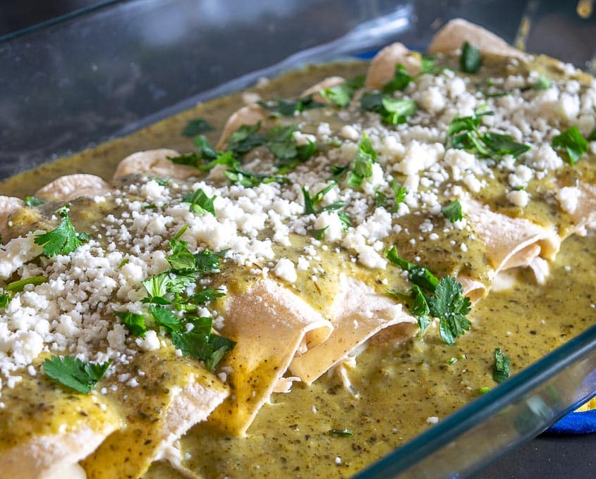 Here's an easy way to make a delicious batch of Creamy Poblano Enchiladas. The sauce is loaded with that sweet roasted Poblano flavor -- so good!