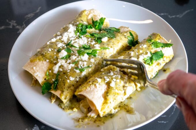 Here's an easy way to make a delicious batch of Creamy Poblano Enchiladas. The sauce is loaded with that sweet roasted Poblano flavor --  so good!