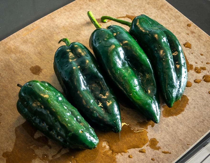 Four Poblano chiles for the creamy Poblano enchiladas