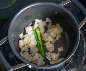 Cooking onion, garlic, and jalapeno for the Avocado Soup