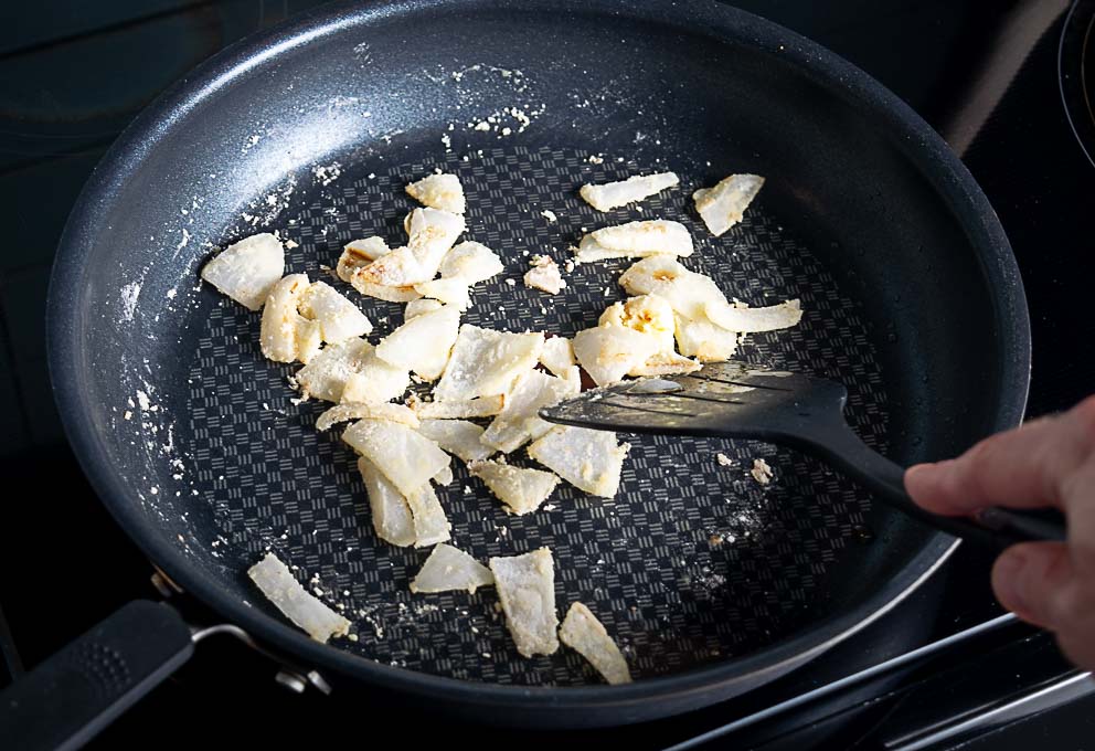 Adding flour to the onion and garlic