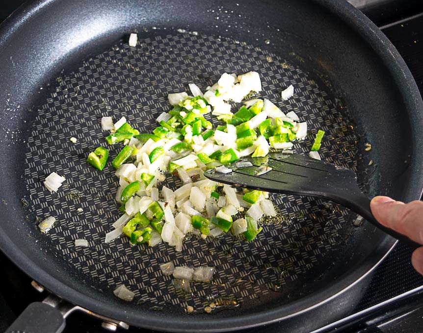 Cooking onion and jalapeno in both oil and butter
