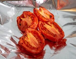 the roasted tomatoes after five minutes underneath the broiler
