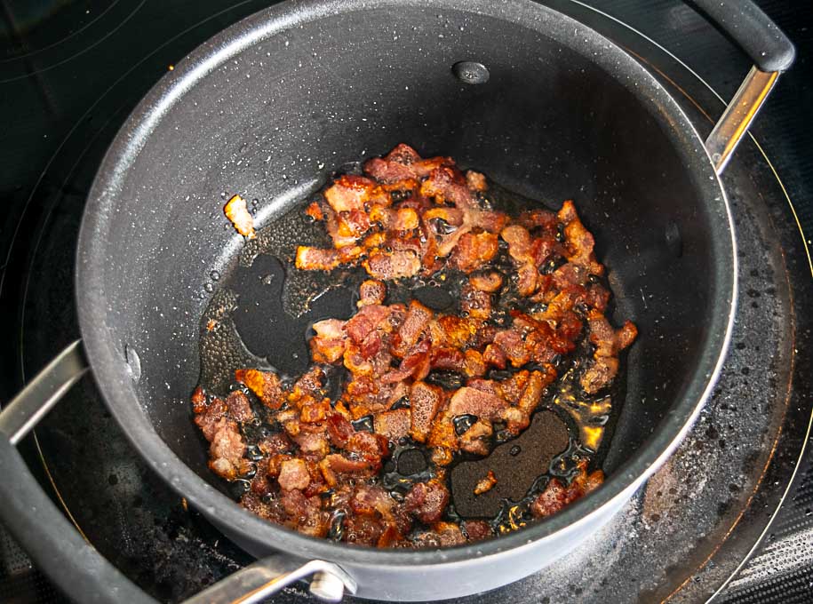 Cooking 2 bacon slices for the Charro Beans