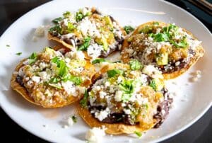 Bean and Rice Tostadas loaded with the Tomato Tomatillo Salsa