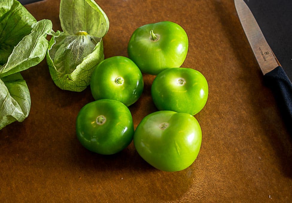 Five tomatillos, rinsed, for the Avocado Salsa Verde