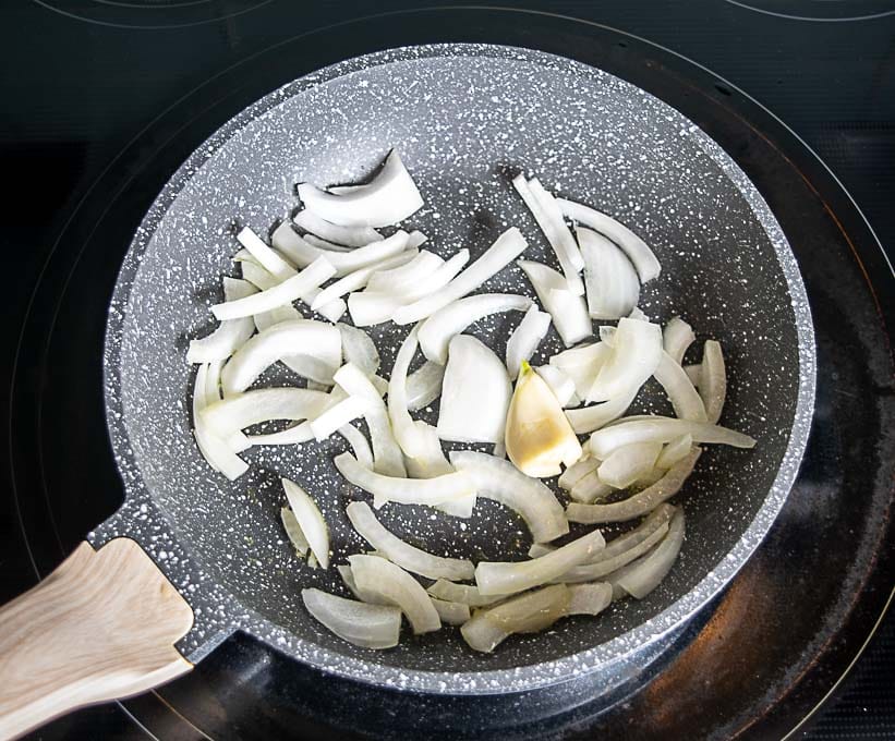 Cooking onion and garlic for the hot sauce