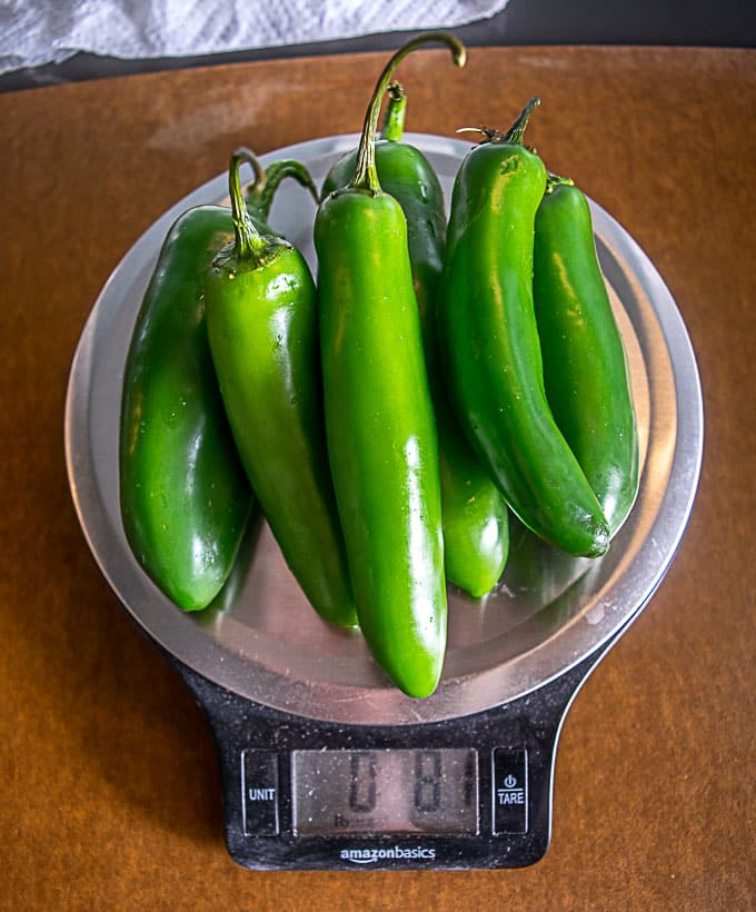 Weighing the chiles on a scale