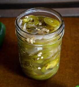 8 oz. jar after adding the pickled jalapeno mixture