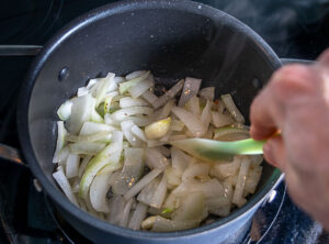 Cooking the onion and garlic in the leftover bacon drippings