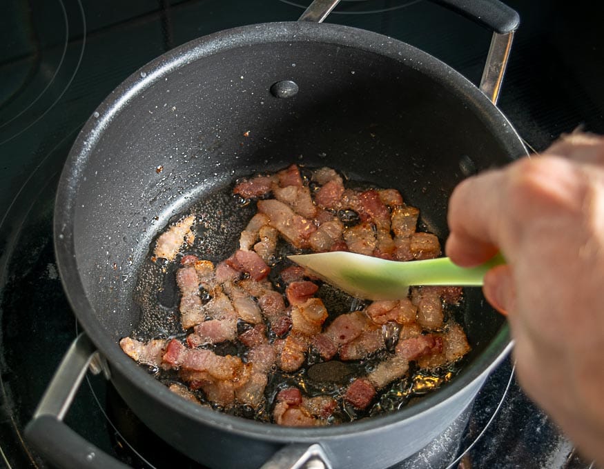 Cooking bacon for the Peruano bean soup