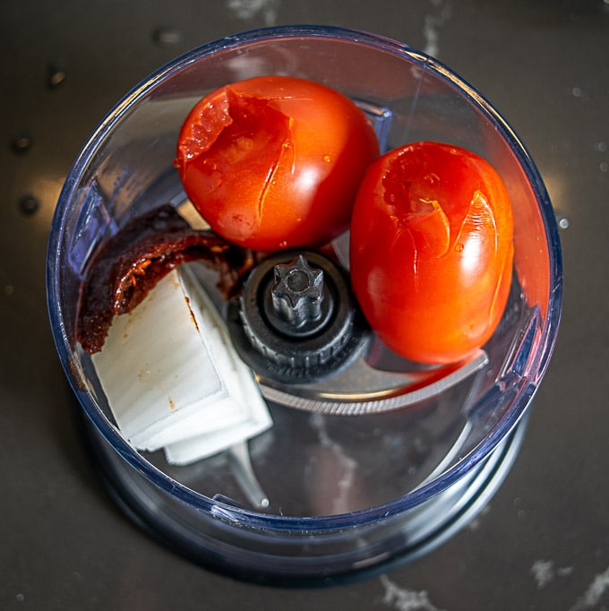 Blending the tomatoes and chipotles together