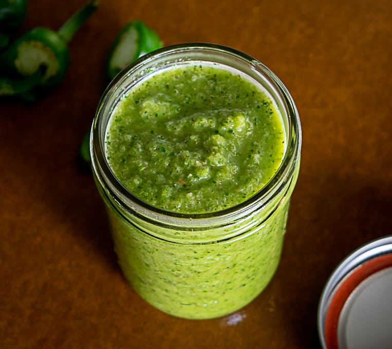 8 oz. jar full of homemade Jalapeno Hot Sauce