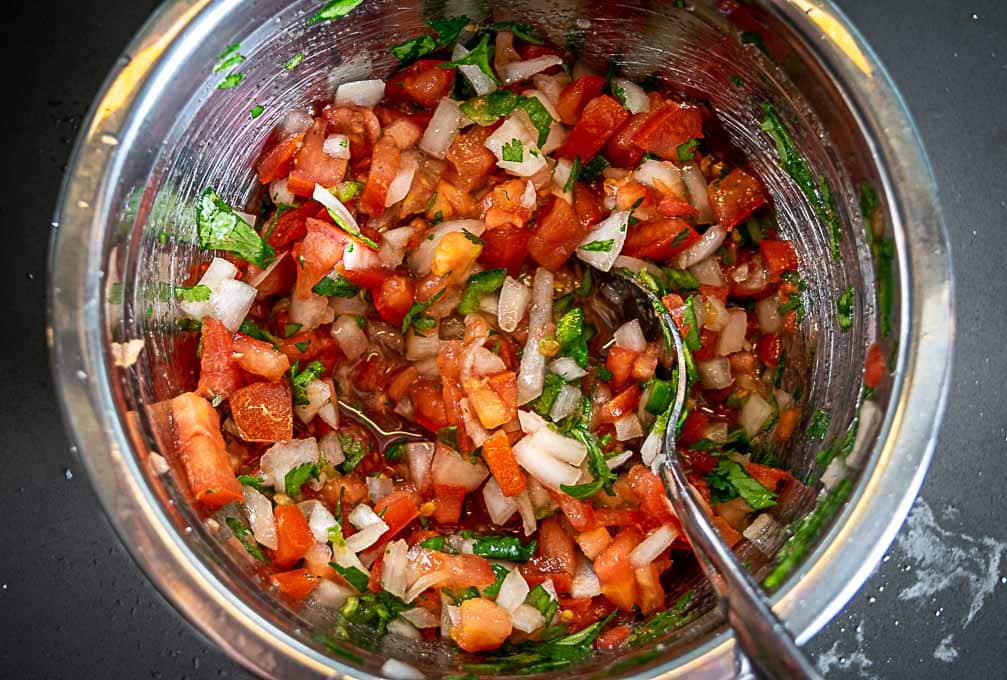 mixing bowl full of pico de gallo