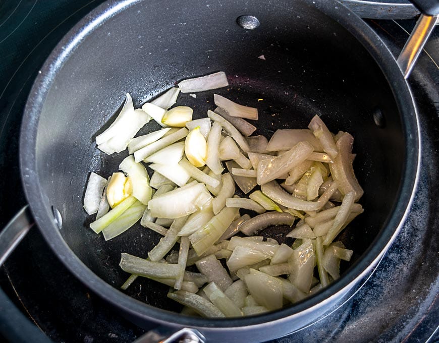 Onion and garlic sweating for the soup